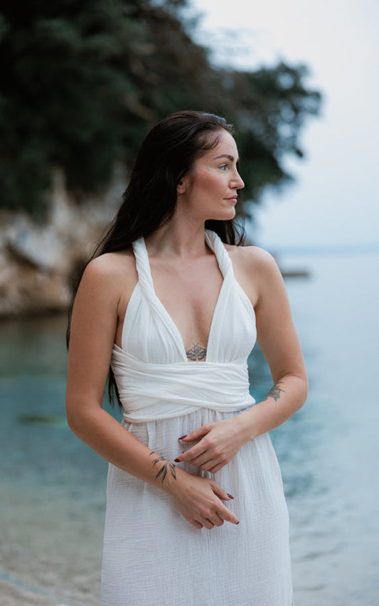White Mayan Goddess Maxi Dress styled with a wrapped halter neckline