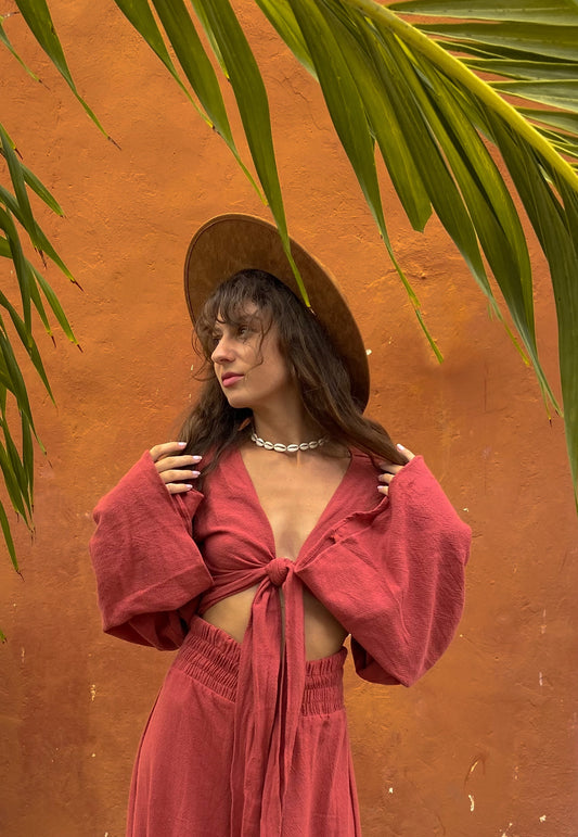 Woman wearing the terracotta Mexico Bohemian Set by Bohème by Ena with a wide-brim hat